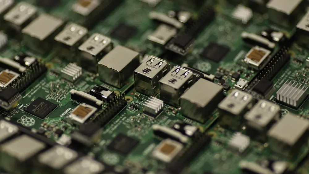 Close-up of chips on a green circuit board