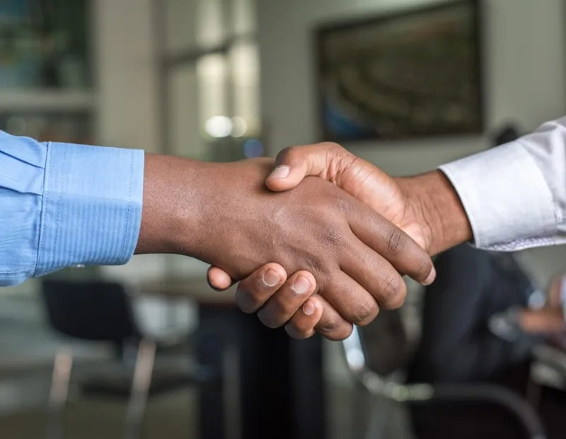 Two teams meeting after connecting over a verified email
